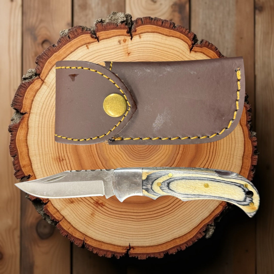 12C27 Stainless Steel Folding Pocket Knife — Pakkawood Handle + Leather Sheath |