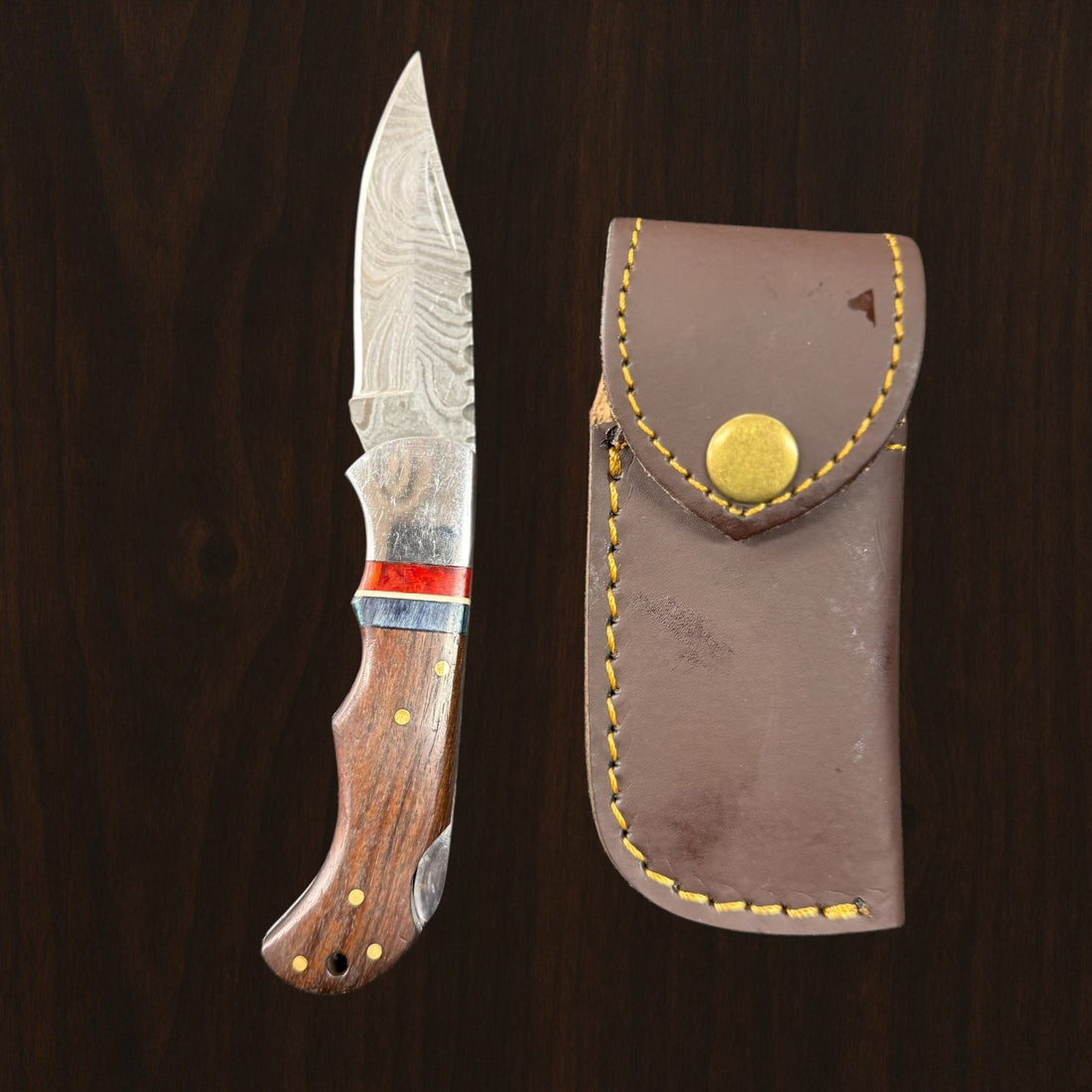 12C27 Stainless Steel Folding Pocket Knife — Pakkawood Handle + Leather Sheath |