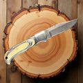 12C27 Stainless Steel Folding Pocket Knife — Pakkawood Handle + Leather Sheath |