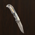 12C27 Stainless Steel Folding Pocket Knife — Pakkawood Handle + Leather Sheath |