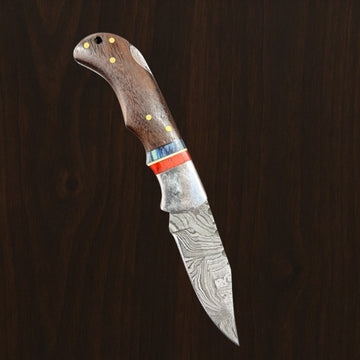 12C27 Stainless Steel Folding Pocket Knife — Pakkawood Handle + Leather Sheath |