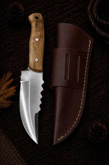 Damascus fixed blade knife with amber bone handle and black leather sheath