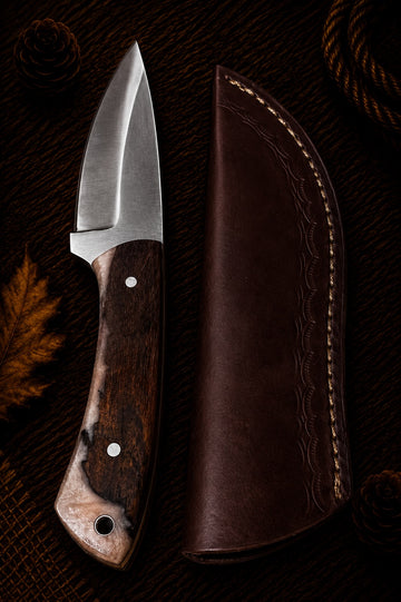 Damascus fixed blade hunting knife with burl wood handle and embossed leather sheath